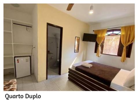 Imagen de la habitación del Hotel Pousada Porto B&uacute;zios. Foto 18