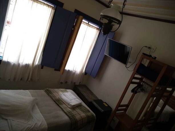 Imagen de la habitación del Hotel Pousada Pouso da Chica. Foto 17