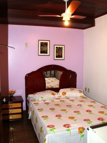 Imagen de la habitación del Hotel Pousada Praia Da Costa. Foto 14