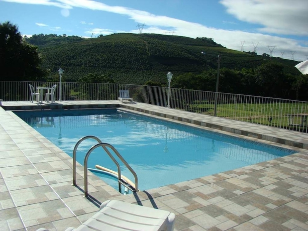 Imagen de la piscina del Hotel Pousada Primavera Da Serra. Foto 12