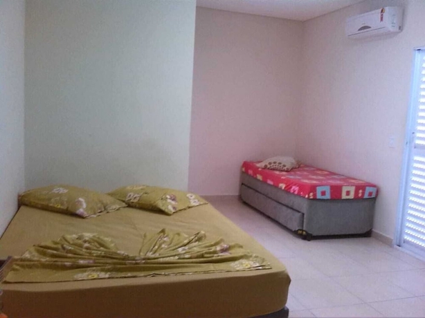 Imagen de la habitación del Hotel Pousada Raios de Sol Indaia. Foto 7