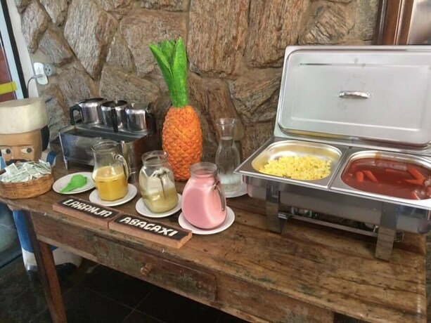Imagen del bar/restaurante del Hotel Pousada Recanto Das Pedras. Foto 17