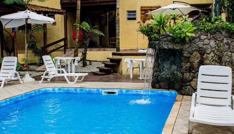 Imagen de la piscina del Hotel Pousada Recanto Dos Tangaras. Foto 31