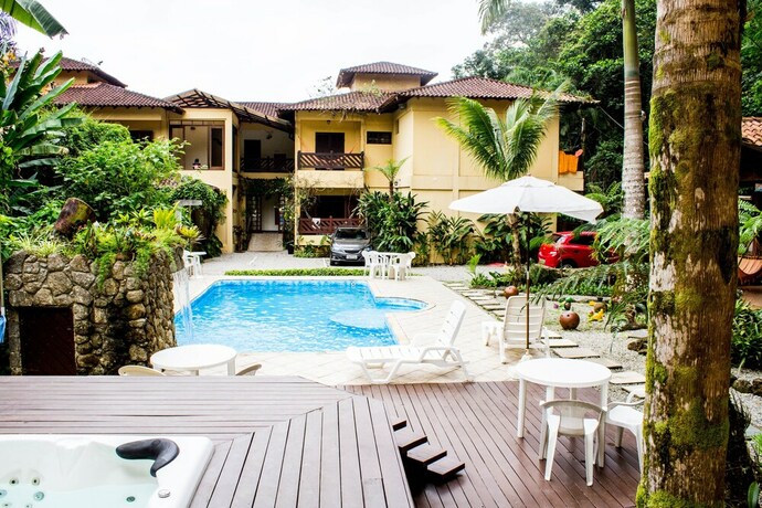 Imagen de la piscina del Hotel Pousada Recanto Dos Tangaras. Foto 32