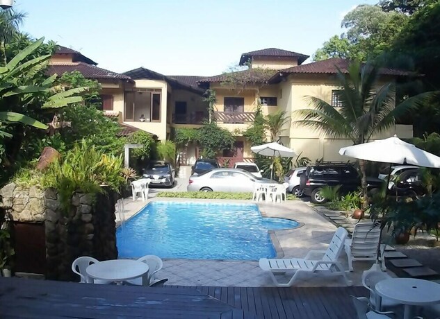 Imagen de la piscina del Hotel Pousada Recanto Dos Tangaras. Foto 33