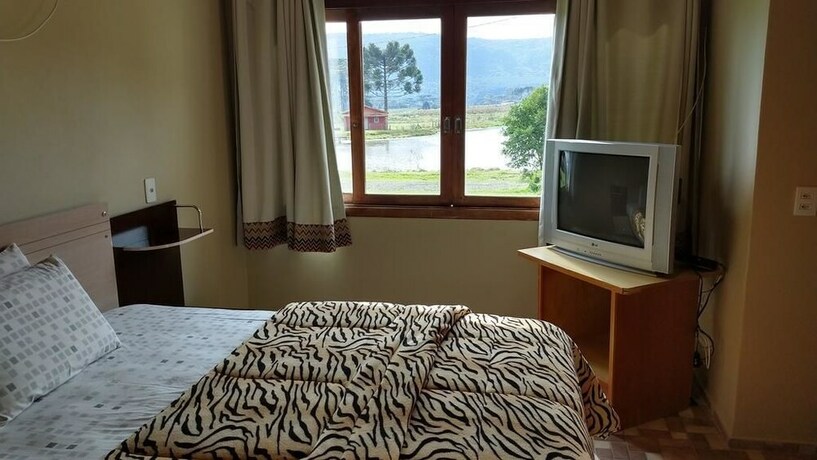 Imagen de la habitación del Hotel Pousada Refugio Do Lago. Foto 23
