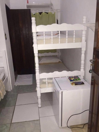 Imagen de la habitación del Hotel Pousada Requinte De Trindade. Foto 3