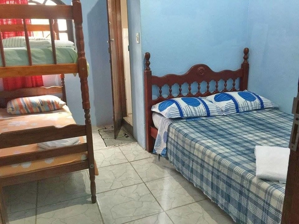 Imagen de la habitación del Hotel Pousada Requinte De Trindade. Foto 8