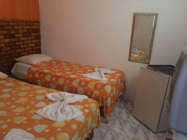 Imagen de la habitación del Hotel Pousada Rosa De Saron. Foto 5