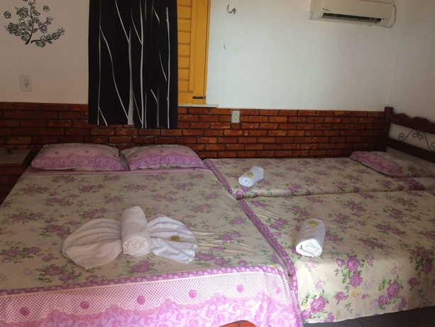 Imagen de la habitación del Hotel Pousada Rosa De Saron. Foto 6