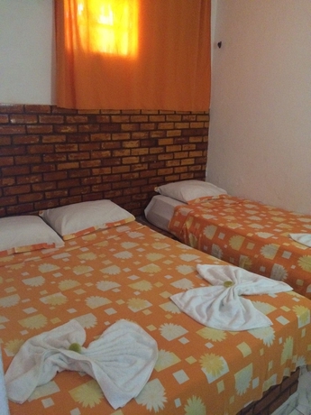 Imagen de la habitación del Hotel Pousada Rosa De Saron. Foto 7