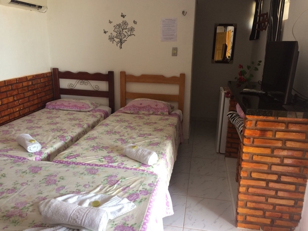 Imagen de la habitación del Hotel Pousada Rosa De Saron. Foto 8