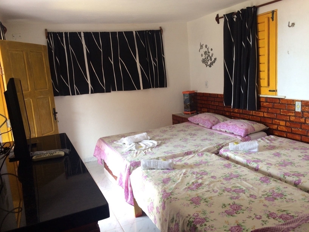 Imagen de la habitación del Hotel Pousada Rosa De Saron. Foto 10