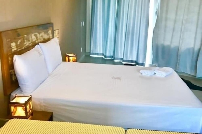 Imagen de la habitación del Hotel Pousada Rosa Karioka. Foto 7