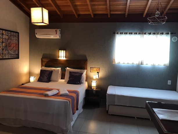 Imagen de la habitación del Hotel Pousada Rosa Karioka. Foto 10