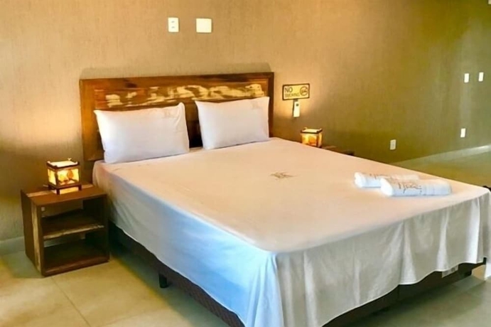 Imagen de la habitación del Hotel Pousada Rosa Karioka. Foto 13