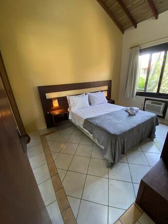 Imagen de la habitación del Hotel Pousada Rosa Studios. Foto 17