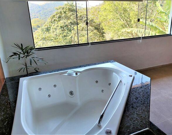 Imagen de la habitación del Hotel Pousada Santa Fe de Penedo, Itatiaia. Foto 18