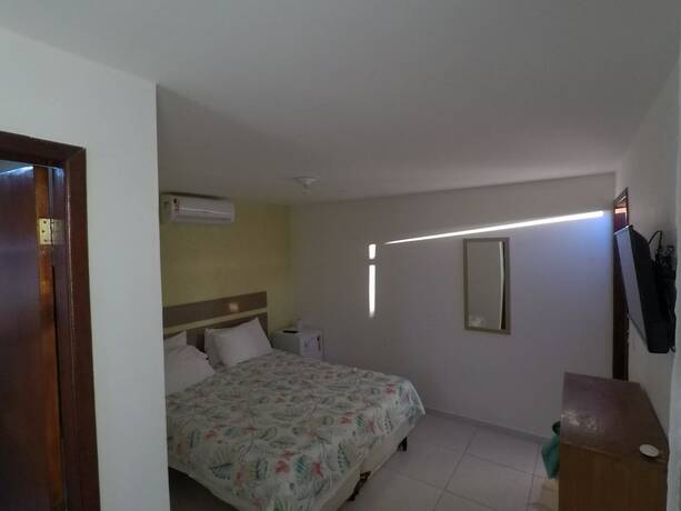 Imagen de la habitación del Hotel Pousada Santa Monica, Saquarema. Foto 17