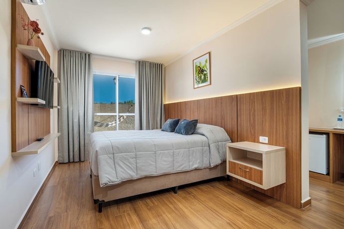 Imagen de la habitación del Hotel Pousada Sol da Mantiqueira. Foto 9