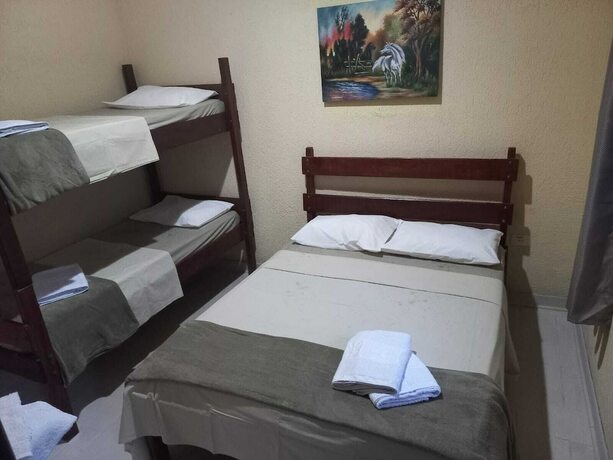 Imagen de la habitación del Hotel Pousada Sol e Lua, Caraguatatuba. Foto 10
