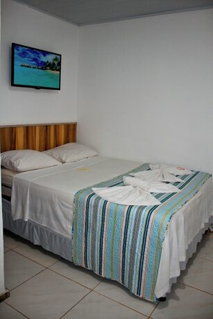 Imagen de la habitación del Hotel Pousada Solar da Praia, Guarapari. Foto 19