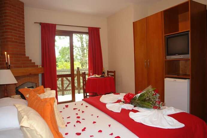 Imagen de la habitación del Hotel Pousada Solar das Montanhas, Itatiaia. Foto 18