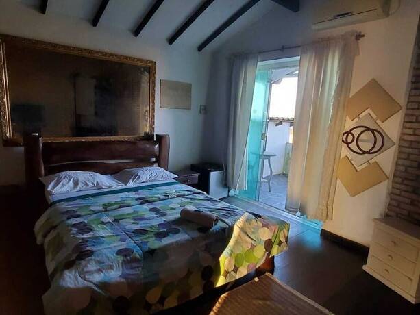 Imagen de la habitación del Hotel Pousada Solar de Tamoios. Foto 9