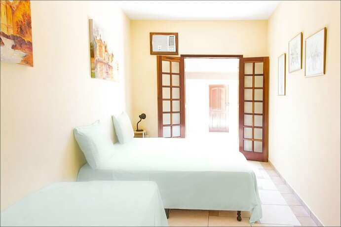 Imagen de la habitación del Hotel Pousada Solarium, Guaruja. Foto 15