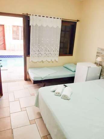 Imagen de la habitación del Hotel Pousada Solarium, Guaruja. Foto 19