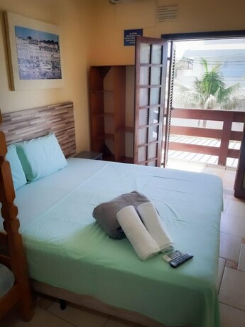 Imagen de la habitación del Hotel Pousada Solarium, Guaruja. Foto 20