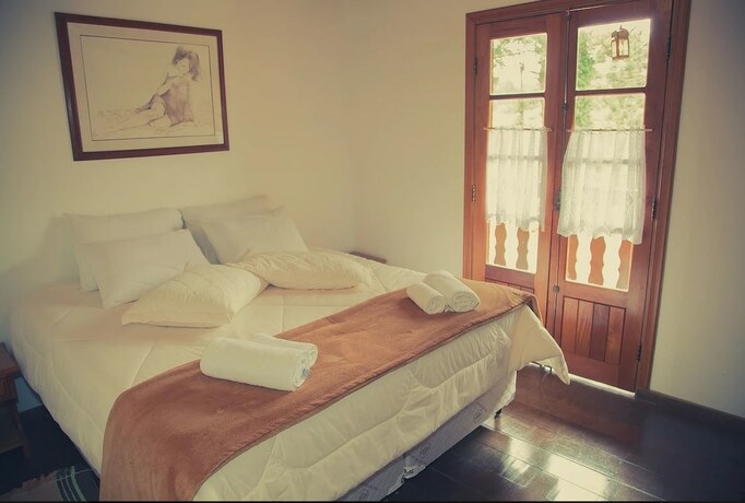 Imagen de la habitación del Hotel Pousada Sonho Verde, Camanducaia. Foto 19