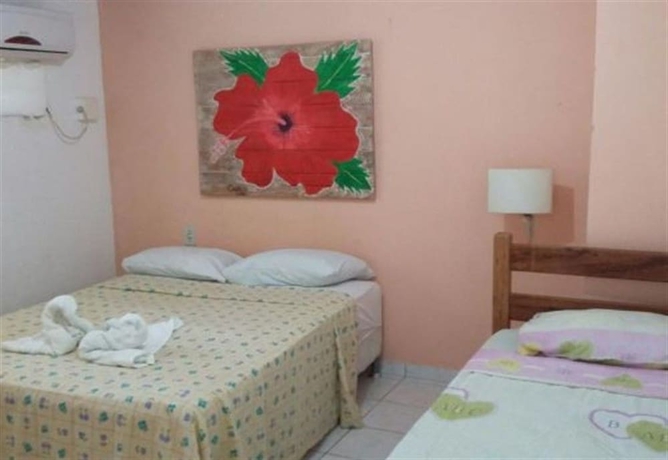 Imagen de la habitación del Hotel Pousada Sossego Suites. Foto 8