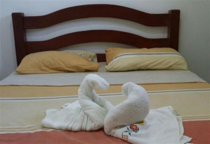 Imagen de la habitación del Hotel Pousada Sossego Suites. Foto 10