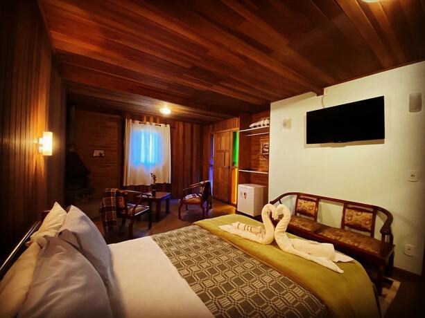 Imagen de la habitación del Hotel Pousada Sotaque Mineiro. Foto 18