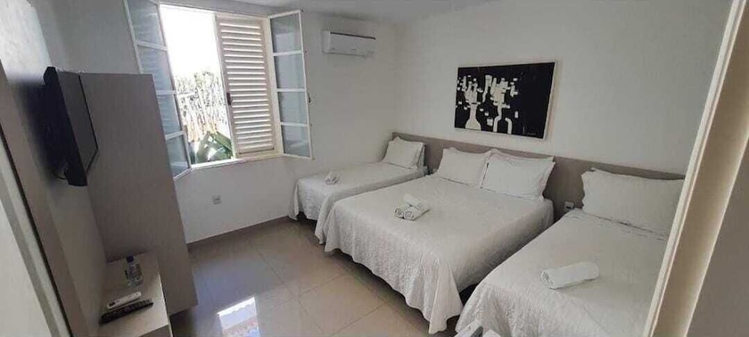 Imagen de la habitación del Hotel Pousada Su&iacute;tes do Lago. Foto 13