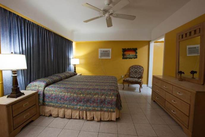 Imagen de la habitación del Hotel Pousada Suites. Foto 4