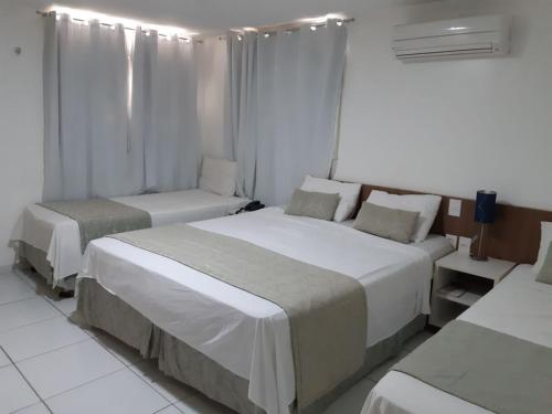 Imagen de la habitación del Hotel Pousada Tambau Familly. Foto 7