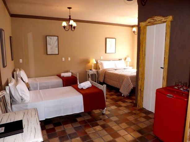 Imagen de la habitación del Hotel Pousada Tiradentes Village. Foto 11