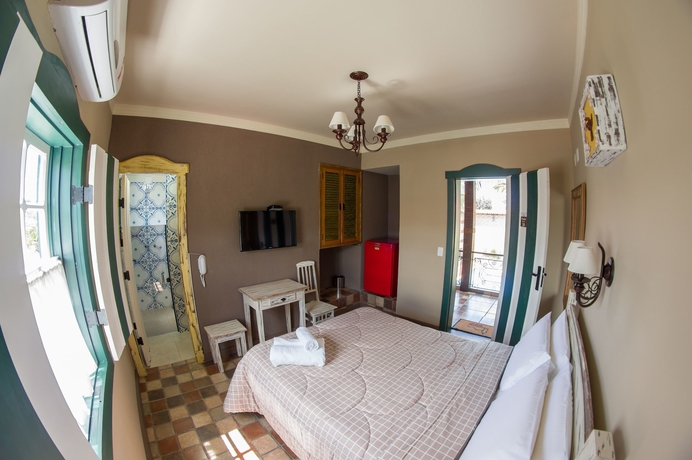 Imagen de la habitación del Hotel Pousada Tiradentes Village. Foto 12