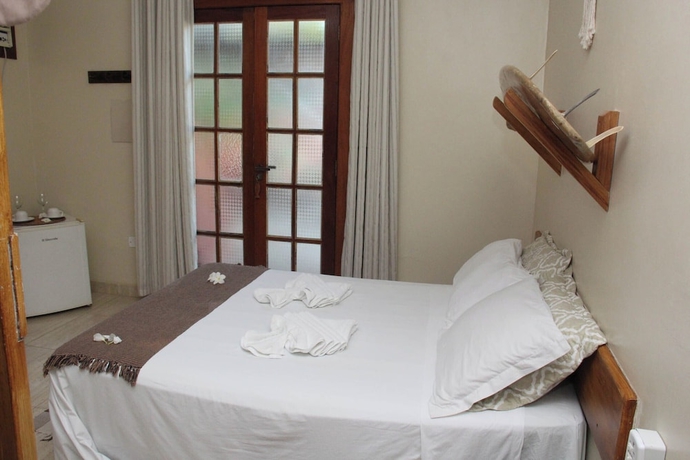 Imagen de la habitación del Hotel Pousada Trancoso Guarapari. Foto 11