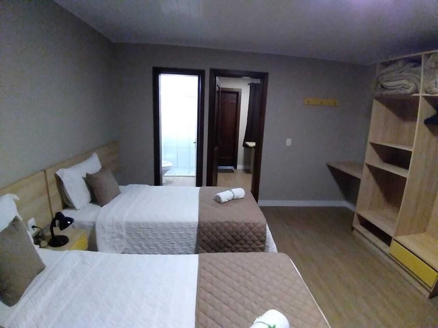 Imagen de la habitación del Hotel Pousada Tr&ecirc;s Pinheiros. Foto 3