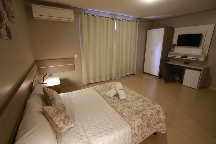 Imagen de la habitación del Hotel Pousada Tr&ecirc;s Pinheiros. Foto 5