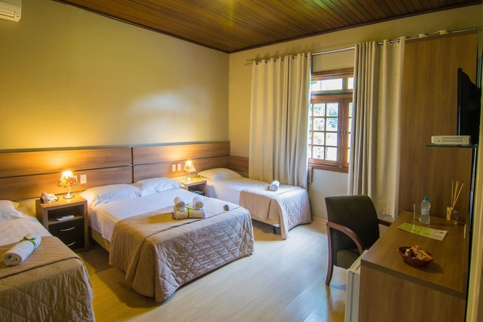 Imagen de la habitación del Hotel Pousada Tr&ecirc;s Pinheiros. Foto 7