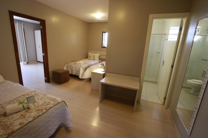 Imagen de la habitación del Hotel Pousada Tr&ecirc;s Pinheiros. Foto 11