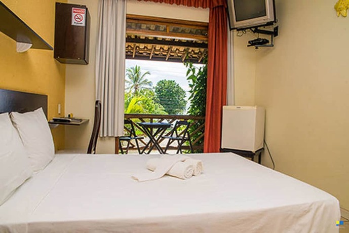 Imagen de la habitación del Hotel Pousada Tropic&aacute;lia. Foto 18