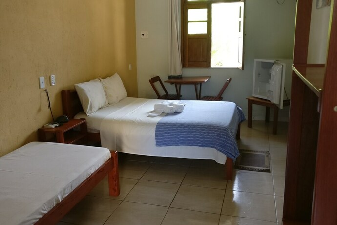 Imagen de la habitación del Hotel Pousada Tropic&aacute;lia. Foto 29