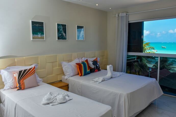 Imagen de la habitación del Hotel Pousada Tropical Maragogi. Foto 19