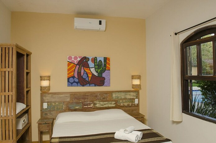 Imagen de la habitación del Hotel Pousada Tupinamb&aacute;. Foto 20