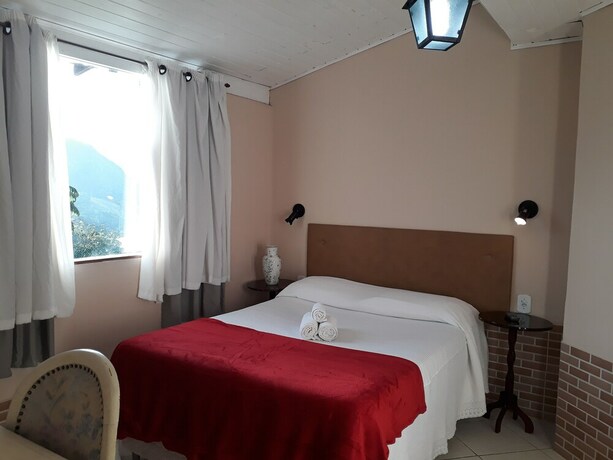 Imagen de la habitación del Hotel Pousada Vale Das Flores. Foto 36